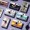 image:imageKodak EKTAR H35N Half Frame Film Camera 35mm Reusable FocusFree Bulb Function Builtin Star Filter Coated Improved Lens Film amp AAA Battery are not Included Striped GreenStriped Silver