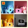 image:imageKodak Printomatic Full Color Instant Print Digital Camera Gift Bundle  Case  Zink 2x3 Sticky Back Photo Paper 20pk  Album  Sticker Sets  Sticker Frames  Hanging Frames  Markers  BlueYellow