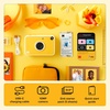 image:imageKodak Printomatic Instant Print Digital Camera Starter Bundle  Carrying Case  Zink 20pk StickyBack Photo Paper  10MP FullColor Photos GB LED Status Indicator  PinkYellow